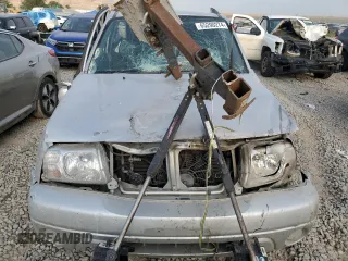 2004 Suzuki Grand Vitara LX z VIN JS3TD62V744104983, wystawiony jako Copart lot #65290274 z przebiegiem Nie podano mil oraz Szkoda całkowita • Salvage title. Historia ofert i sprzedaży dostępna na DreamBid. Obrazek 12.