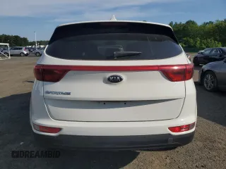 2018 Kia Sportage LX z VIN KNDPMCAC7J7448175, wystawiony jako Copart lot #59800765 z przebiegiem 138 825 mil mil oraz Czysty tytuł • Clean title. Historia ofert i sprzedaży dostępna na DreamBid. Obrazek 6.