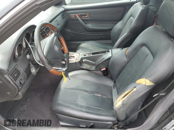 2002 Mercedes-Benz SLK 320 with VIN WDBKK65FX2F237273, listed as a Copart auction lot 61068345 with 193,304 mi miles and Salvage title. Bid and sale history available at DreamBid. Image 7.
