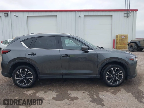 2023 Mazda CX-5 2.5 S Premium Plus Package with VIN JM3KFBEM2P0163054, listed as a IAAI auction lot 41642461 with 18,508 mi miles. Bid and sale history available at carsss.com. Image 13.