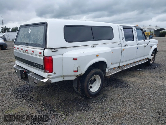1995 Ford F-350 z VIN 1FTJW35G2SEA08715, wystawiony jako IAAI lot #41997319 z przebiegiem 204 657 mil mil oraz . Historia ofert i sprzedaży dostępna na DreamBid. Obrazek 4.