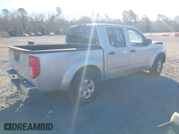 2013 Nissan Frontier SV with VIN 1N6AD0EV6DN720356, listed as a IAAI auction lot 41694570 with 243,279 mi miles and . Bid and sale history available at DreamBid. Image 4.