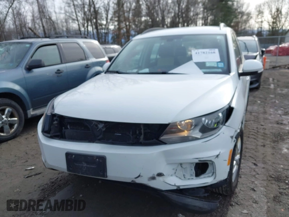 2017 Volkswagen Tiguan S with VIN WVGBV7AX3HK020883, listed as a IAAI auction lot 41782168 with 87,650 mi miles and . Bid and sale history available at DreamBid. Image 12.