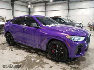 2022 BMW X6 M50i with VIN 5UXCY8C07N9K85135, listed as a Copart auction lot 45385725 with 57,106 mi miles and Salvage Title. Bid and sale history available at carsss.com. Image 4.