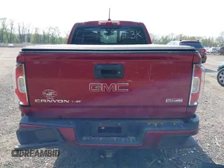 2019 GMC Canyon 4WD All Terrain z VIN 1GTG6FEN1K1290802, wystawiony jako IAAI lot #42150541 z przebiegiem 41 296 mil mil oraz . Historia ofert i sprzedaży dostępna na DreamBid. Obrazek 17.
