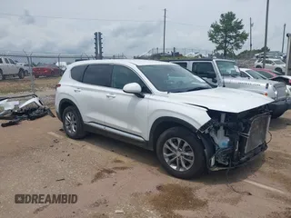 2019 Hyundai Santa Fe SE with VIN 5NMS23AD0KH108904, listed as a IAAI auction lot 42441674 with 129,203 mi miles and . Bid and sale history available at DreamBid. Image 1.