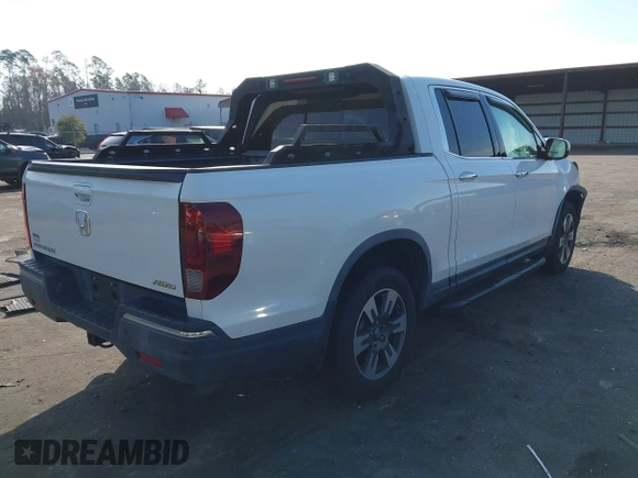 2018 Honda Ridgeline RTL-E with VIN 5FPYK3F71JB001753, listed as a IAAI auction lot 41510248 with 84,551 mi miles and . Bid and sale history available at DreamBid. Image 4.
