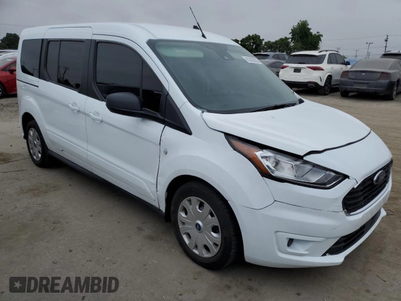 2022 Ford Transit Connect XLT with VIN NM0GS9F28N1514084, listed as a Copart auction lot 62392655 with 43,395 mi miles and Salvage title. Bid and sale history available at DreamBid. Image 4.