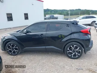 2018 Toyota C-HR XLE z VIN NMTKHMBX8JR008430, wystawiony jako IAAI lot #42635658 z przebiegiem 176 462 mil mil oraz . Historia ofert i sprzedaży dostępna na DreamBid. Obrazek 14.
