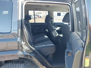 2010 Jeep Commander Sport z VIN 1J4RG4GK4AC158319, wystawiony jako IAAI lot #41824621 z przebiegiem 63 061 mil mil oraz . Historia ofert i sprzedaży dostępna na DreamBid. Obrazek 8.