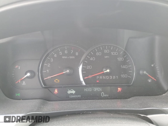 2006 Cadillac DTS 1SD z VIN 1G6KD57Y26U115094, wystawiony jako Copart lot #53534355 z przebiegiem 126 631 mil mil oraz Szkoda całkowita • Salvage title. Historia ofert i sprzedaży dostępna na DreamBid. Obrazek 9.