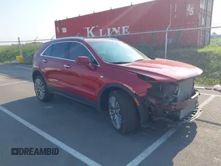 2025 Cadillac XT4 AWD Premium Luxury with VIN 1GYFZDR42SF118428, listed as a IAAI auction lot 42376074 with 13,758 mi miles and . Bid and sale history available at DreamBid. Image 1.
