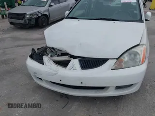 2005 Mitsubishi Lancer ES z VIN JA3AJ26E35U025117, wystawiony jako IAAI lot #41634961 z przebiegiem 206 822 mil mil oraz . Historia ofert i sprzedaży dostępna na DreamBid. Obrazek 13.