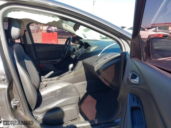 2015 Ford Focus SE with VIN 1FADP3F22FL264972, listed as a IAAI auction lot 41674698 with 117,376 mi miles. Bid and sale history available at carsss.com. Image 5.