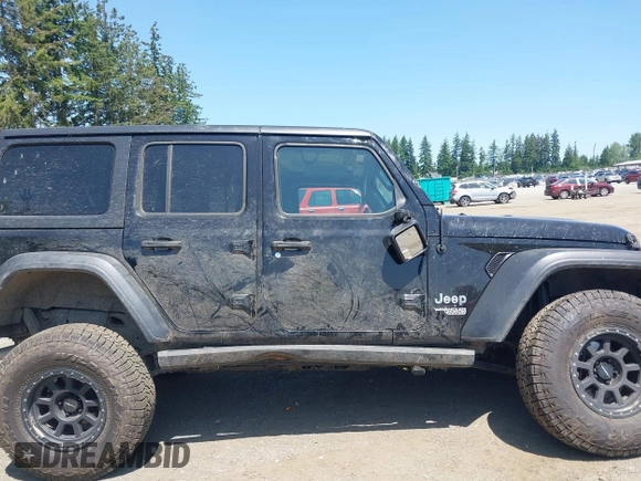 2018 Jeep Wrangler Unlimited Sport S with VIN 1C4HJXDN1JW216825, listed as a IAAI auction lot 42405799 with 37,194 mi miles and . Bid and sale history available at DreamBid. Image 13.
