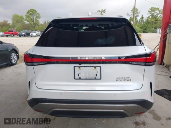 2023 Lexus RX with VIN 2T2BAMBA2PC005540, listed as a IAAI auction lot 41089893 with 27,960 mi miles. Bid and sale history available at carsss.com. Image 16.
