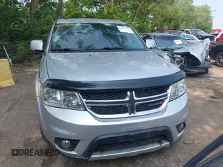 2012 Dodge Journey SXT with VIN 3C4PDDBG1CT323727, listed as a IAAI auction lot 42473238 with 77,035 mi miles and . Bid and sale history available at DreamBid. Image 12.