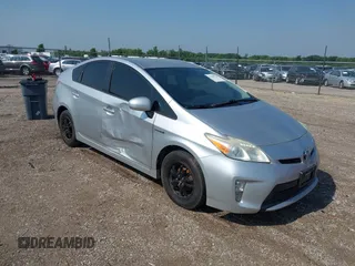 2012 Toyota Prius One z VIN JTDKN3DU9C5445272, wystawiony jako IAAI lot #42440749 z przebiegiem 184 983 mil mil oraz . Historia ofert i sprzedaży dostępna na DreamBid. Obrazek 1.