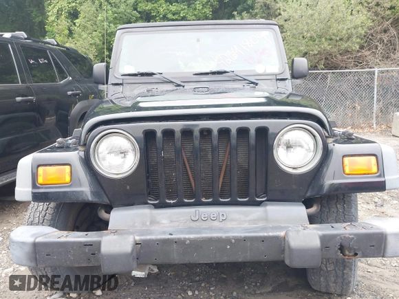 2004 Jeep Wrangler SE with VIN 1J4FA291X4P800973, listed as a IAAI auction lot 42691809 with 116,942 mi miles and . Bid and sale history available at DreamBid. Image 6.