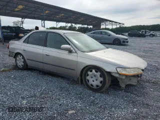 1998 Honda Accord LX with VIN 1HGCG5548WA156745, listed as a Copart auction lot 61944775 with 357,402 mi miles and Salvage title. Bid and sale history available at DreamBid. Image 4.