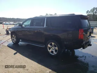 2015 Chevrolet Suburban LTZ with VIN 1GNSKKKC2FR210780, listed as a Copart auction lot 47207445 with 163,448 mi miles and Salvage Title. Bid and sale history available at carsss.com. Image 2.