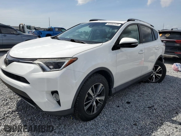 2018 Toyota RAV4 XLE with VIN 2T3RFREV1JW843426, listed as a Copart auction lot 52283125 with 12,809 mi miles and Salvage Title. Bid and sale history available at DreamBid. Image 1.