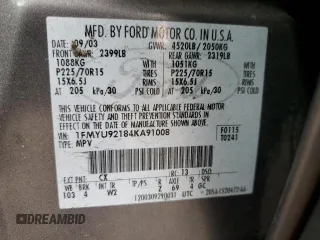 2004 Ford Escape XLS with VIN 1FMYU92184KA91008, listed as a Copart auction lot 80793134 with 159,429 mi miles and Salvage Title. Bid and sale history available at DreamBid. Image 13.