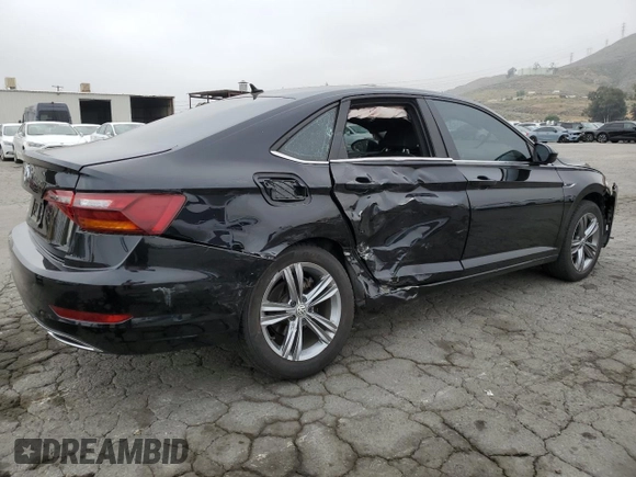 2019 Volkswagen Jetta S с VIN 3VWC57BU5KM063325, выставлен на аукционе Copart как лот 57286335 с пробегом 89 394 миль миль и Списание • Salvage title. История ставок и продаж доступна на DreamBid. Изображение 3.