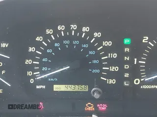 1999 Lexus LX 470 z VIN JT6HT00W8X0045705, wystawiony jako IAAI lot #42005587 z przebiegiem 443 758 mil mil oraz . Historia ofert i sprzedaży dostępna na DreamBid. Obrazek 15.