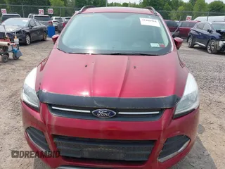 2016 Ford Escape SE z VIN 1FMCU9GX6GUB29495, wystawiony jako IAAI lot #42406964 z przebiegiem 103 892 mil mil oraz . Historia ofert i sprzedaży dostępna na DreamBid. Obrazek 6.