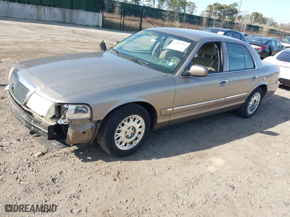 2003 Mercury Grand Marquis GS Convenience with VIN 2MEFM74W43X681774, listed as a IAAI auction lot 42057422 with 218,422 mi miles. Bid and sale history available at carsss.com. Image 2.