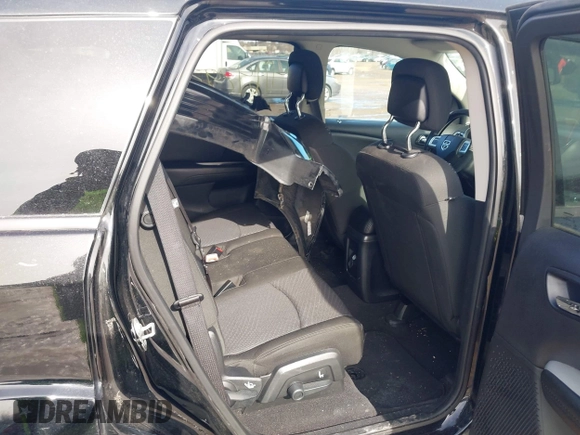2019 Dodge Journey SE with VIN 3C4PDCBB1KT694545, listed as a IAAI auction lot 41642930 with 103,935 mi miles and . Bid and sale history available at DreamBid. Image 8.