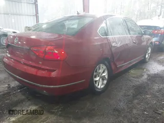 2016 Volkswagen Passat S with VIN 1VWAT7A31GC046553, listed as a IAAI auction lot 41969421 with 106,821 mi miles and . Bid and sale history available at DreamBid. Image 6.