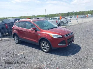 2015 Ford Escape Titanium with VIN 1FMCU0JX5FUB77475, listed as a IAAI auction lot 42103388 with 113,018 mi miles. Bid and sale history available at carsss.com. Image 1.