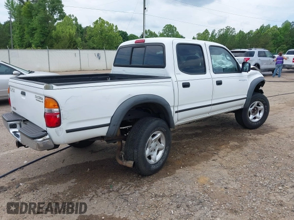 2001 Toyota Tacoma PreRunner z VIN 5TEGN92N11Z738985, wystawiony jako IAAI lot #42145856 z przebiegiem 385 673 mil mil oraz . Historia ofert i sprzedaży dostępna na DreamBid. Obrazek 4.