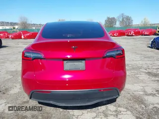 2021 Tesla Model Y Standard Range with VIN 5YJYGDED1MF111410, listed as a IAAI auction lot 41942323 with 24,836 mi miles. Bid and sale history available at carsss.com. Image 15.