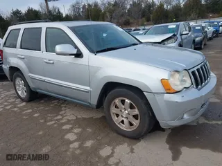 2009 Jeep Grand Cherokee Limited with VIN 1J8HR58P99C538725, listed as a IAAI auction lot 41466122 with 220,803 mi miles. Bid and sale history available at carsss.com. Image 1.