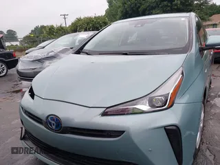 2022 Toyota Prius L Eco with VIN JTDKAMFU4N3158998, listed as a IAAI auction lot 42625041 with 43,033 mi miles and . Bid and sale history available at DreamBid. Image 13.