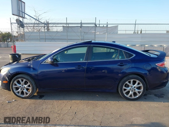 2009 Mazda 6 S Grand Touring with VIN 1YVHP82BX95M21357, listed as a IAAI auction lot 42013043 with 119,701 mi miles and . Bid and sale history available at DreamBid. Image 15.