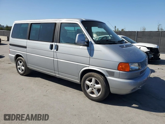 2002 Volkswagen EuroVan с VIN WV2KB47012H065431, выставлен на аукционе Copart как лот 49010445 с пробегом 78 985 миль миль и Чистый • Clean title. История ставок и продаж доступна на DreamBid. Изображение 4.
