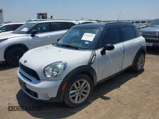 2014 MINI Countryman S with VIN WMWZC3C54EWP27859, listed as a IAAI auction lot 39592610 with 105,264 mi miles and . Bid and sale history available at DreamBid. Image 2.