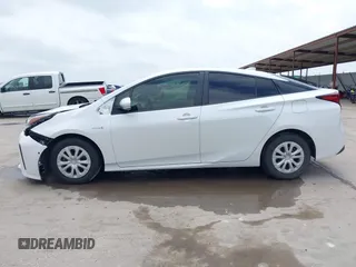 2022 Toyota Prius L Eco with VIN JTDKAMFUXN3157225, listed as a IAAI auction lot 39292379 with 59,333 mi miles and . Bid and sale history available at DreamBid. Image 15.