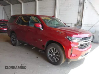 2021 Chevrolet Tahoe LT with VIN 1GNSKNKD4MR334864, listed as a IAAI auction lot 42570802 with 74,038 mi miles and . Bid and sale history available at DreamBid. Image 1.