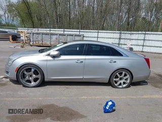 2013 Cadillac XTS Luxury z VIN 2G61P5S3XD9178601, wystawiony jako IAAI lot #42154859 z przebiegiem 111 227 mil mil oraz . Historia ofert i sprzedaży dostępna na DreamBid. Obrazek 14.