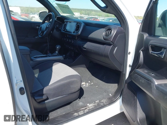2023 Toyota Tacoma SR z VIN 3TYCZ5AN5PT151681, wystawiony jako IAAI lot #41936577 z przebiegiem 30 056 mil mil oraz . Historia ofert i sprzedaży dostępna na DreamBid. Obrazek 5.