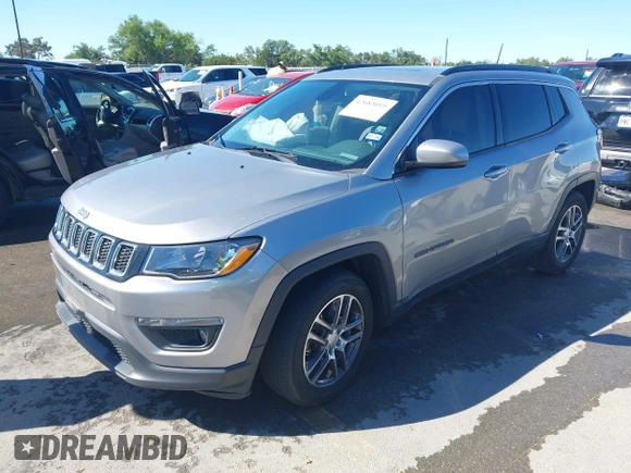 2019 Jeep Compass Altitude with VIN 3C4NJCBB1KT819754, listed as a IAAI auction lot 42083019 with 79,949 mi miles and . Bid and sale history available at DreamBid. Image 2.