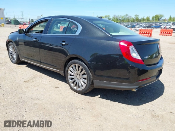 2013 Lincoln MKS z VIN 1LNHL9EK3DG617815, wystawiony jako IAAI lot #42239784 z przebiegiem 122 589 mil mil oraz . Historia ofert i sprzedaży dostępna na DreamBid. Obrazek 3.