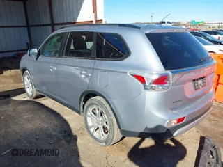 2015 Mitsubishi Outlander SE with VIN JA4AD3A34FZ011259, listed as a IAAI auction lot 41290830 with 88,147 mi miles and . Bid and sale history available at DreamBid. Image 3.