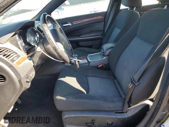 2012 Chrysler 300 with VIN 2C3CCAAG9CH201079, listed as a Copart auction lot 80343504 with 137,593 mi miles and Salvage Title. Bid and sale history available at DreamBid. Image 7.