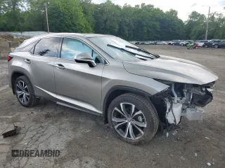2022 Lexus RX 350 with VIN 2T2HZMDA4NC326539, listed as a Copart auction lot 58724655 with 8,869 mi miles and Salvage title. Bid and sale history available at DreamBid. Image 4.